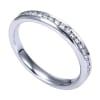 Beautiful round diamonds are set into a 14k white gold channel in this fresh and classic white gold diamond wedding band! - Image 3 of 0