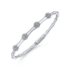 This station style white gold diamond bangle features cluster set diamond sections that total o.40 carats in diamonds, with bead style finishes in white gold down the bangle. - Image 2 of 0