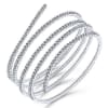 A swirling 14k white gold diamond bangle with over 2 carats of diamond splendor. - Image 2 of 0