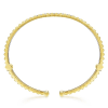 This 14k two tone cuff bangle features one half carats of diamonds. - Image 3 of 0