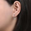 14k white gold mixes with round brilliant diamonds to create this contemporary take on the classic diamond hoop earring! - Image 4 of 0
