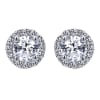 This 14k white gold diamond stud earring features nearly one quarter carat of diamonds in a halo with a round diamonds in center. - Image 1 of 0
