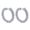 This 14k white gold diamond hoop pair of earrings features 1.98 carats of round brilliant diamonds shining all around this 14k white gold hoop setting. - Image 1 of 0