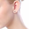 This 14k yellow gold diamond stud earring partners with sapphires. - Image 4 of 0
