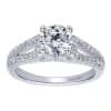 This wonderfully set round diamond split shank diamond engagement ring shimmers and glistens with over one quarter carats of round brilliant diamonds and is offered to you in white gold or platinum. - Image 1 of 0