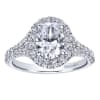This studded oval diamond halo engagement ring with shimmering round brilliant diamonds is a definite show stopping engagement ring for your lady! - Image 1 of 0