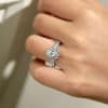 This studded oval diamond halo engagement ring with shimmering round brilliant diamonds is a definite show stopping engagement ring for your lady! - Image 2 of 0