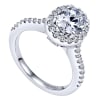 Round brilliant diamonds climb their way up this white gold or platinum band to form a diamond halo surrounding an oval cut diamond of your choice in this diamond oval halo engagement ring! - Image 3 of 0