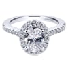 Round brilliant diamonds climb their way up this white gold or platinum band to form a diamond halo surrounding an oval cut diamond of your choice in this diamond oval halo engagement ring! - Image 4 of 0