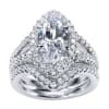 If you're looking for a marquise center diamond, you won't find a better halo engagement ring to surround it with this contemporary marquise halo engagement ring in white gold or platinum. - Image 5 of 0