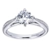 An 18k white gold contemporary straight engagement ring with a twist, featuring round brilliant diamonds and a six prong setting in this engagement ring, - Image 1 of 0