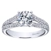 Double diamond rows of round brilliant diamonds crawl their way up this split shank diamond engagement ring, meeting a round center diamond of oyur choice. - Image 1 of 0