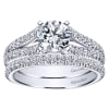 Double diamond rows of round brilliant diamonds crawl their way up this split shank diamond engagement ring, meeting a round center diamond of oyur choice. - Image 5 of 0