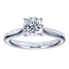 Simplicity at its finest, this smooth band thoughtfully cradles a round center diamond in a sturdy 4 prong setting in this solitaire engagement ring. - Image 1 of 0