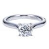 Simplicity at its finest, this smooth band thoughtfully cradles a round center diamond in a sturdy 4 prong setting in this solitaire engagement ring. - Image 2 of 0