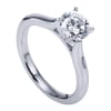 Simplicity at its finest, this smooth band thoughtfully cradles a round center diamond in a sturdy 4 prong setting in this solitaire engagement ring. - Image 4 of 0