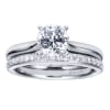 Simplicity at its finest, this smooth band thoughtfully cradles a round center diamond in a sturdy 4 prong setting in this solitaire engagement ring. - Image 5 of 0