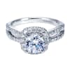 Double the bands for double the pleasure in this white gold or platinum contemporary halo engagement ring with round diamonds. - Image 2 of 0