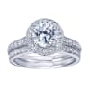 Your choice of platinum or white gold in this vintage style halo engagement ring with 3/4 carats of round brilliant diamonds and a round center diamond of your choice. - Image 5 of 0