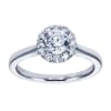 A round brilliant halo contrasts perfectly with the sleek white gold band in this contemporary halo engagement ring available in platinum or white gold. - Image 1 of 0