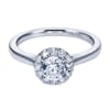 A round brilliant halo contrasts perfectly with the sleek white gold band in this contemporary halo engagement ring available in platinum or white gold. - Image 2 of 0