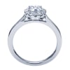 A round brilliant halo contrasts perfectly with the sleek white gold band in this contemporary halo engagement ring available in platinum or white gold. - Image 3 of 0