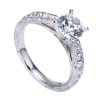 A round center diamond sits perfectly in a vintage inspired straight engagement ring with side round brilliant diamonds. - Image 4 of 0