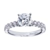 Round prong set brilliant diamonds lift this contemporary straight engagement ring designed by Gabriel & Co. - Image 1 of 0