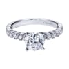 Round prong set brilliant diamonds lift this contemporary straight engagement ring designed by Gabriel & Co. - Image 2 of 0