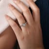 Straight white gold bands and round diamonds firm up this white gold contemporary straight engagement ring. - Image 2 of 0