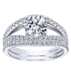 This uniquely style diamond engagement ring with a split shank band features over one half carats of round brilliant diamonds! - Image 5 of 0