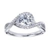 This unique diamond engagement ring fits a round center diamond and shimmers with one quarter carats of round brilliant diamonds that wrap around beautiful and sleek white gold or platinum. - Image 1 of 0