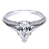 This diamond encrusted engagement ring holds a pear cut center diamond and holds 1/3 carats of round diamonds in its split shank diamond engagement ring setting. - Image 4 of 0
