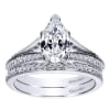 This diamond encrusted engagement ring holds a pear cut center diamond and holds 1/3 carats of round diamonds in its split shank diamond engagement ring setting. - Image 5 of 0