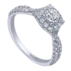 This unique and well crafted vintage style halo engagement ring features a split shank full of round brilliant diamonds and includes a round center diamond! - Image 3 of 0