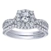 This unique and well crafted vintage style halo engagement ring features a split shank full of round brilliant diamonds and includes a round center diamond! - Image 5 of 0