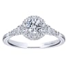 This white gold diamond engagement ring comes with a round center diamond and a beautiful round diamond halo to hold in all that shine! - Image 1 of 0
