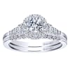 This white gold diamond engagement ring comes with a round center diamond and a beautiful round diamond halo to hold in all that shine! - Image 5 of 0