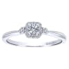 This 14k white gold petite diamond halo engagement ring is studded with 0.19 carats in round brilliant diamonds is a simple and sleek diamond engagement ring that makes a clear message. - Image 1 of 0