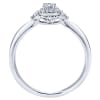 This 14k white gold petite diamond halo engagement ring is studded with 0.19 carats in round brilliant diamonds is a simple and sleek diamond engagement ring that makes a clear message. - Image 2 of 0