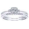 This 14k white gold petite diamond halo engagement ring is studded with 0.19 carats in round brilliant diamonds is a simple and sleek diamond engagement ring that makes a clear message. - Image 5 of 0