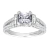 This diamond studded split shank princess cut diamond engagement ring glistens with 0.39 carats of round brilliant diamonds, all cushioning a princess cut center diamond. - Image 1 of 0