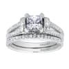 This diamond studded split shank princess cut diamond engagement ring glistens with 0.39 carats of round brilliant diamonds, all cushioning a princess cut center diamond. - Image 5 of 0