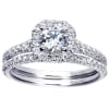 This 14k white gold diamond engagement ring uses round brilliant diamonds and a diamond halo to make its message! With 3/4 carats of round diamonds laid over sleek white gold the message is loud and clear! - Image 5 of 0