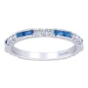 Sapphires line up with diamonds over 14k white gold in this sapphire and diamond stackable ring featuring one third carats in sapphire and almost one half carats in round diamonds. - Image 1 of 0