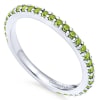 A row of peridot stones shimmer in this 14k white gold stackable ring. - Image 3 of 0
