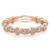 A 14k rose gold diamond stackable ring with 0.27 carats of diamonds. - Image 1 of 0
