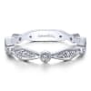 This 14k white gold diamond stackable ring features dramatic diamond sections. - Image 1 of 0