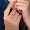 This 14k yellow gold ring showcases a modern sensibility with diamonds and a unique style. - Image 2 of 0