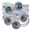 This sterling silver fashion ring glows with the multi color stones set into it. - Image 1 of 0